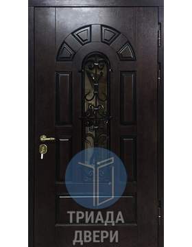 дверь с ковкой поверх стекла